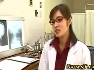 Asian woman medical person handjob
